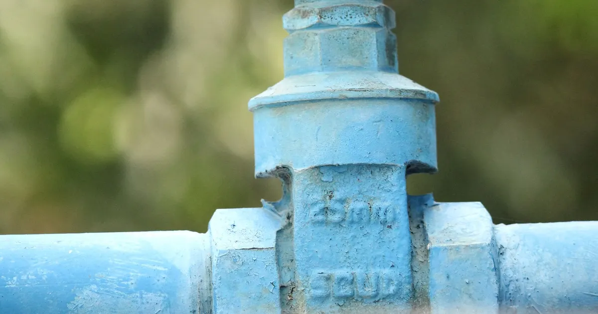 Handwheel valve on an outdoor water pipe, a fitting where acetal valve parts such as stems and seats are sometimes used inside